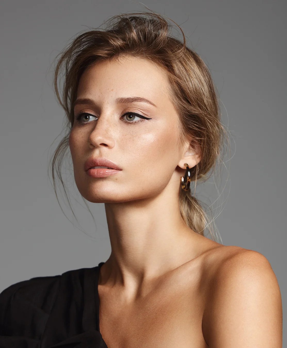 Beautiful woman with a very youthful looking face and neck.