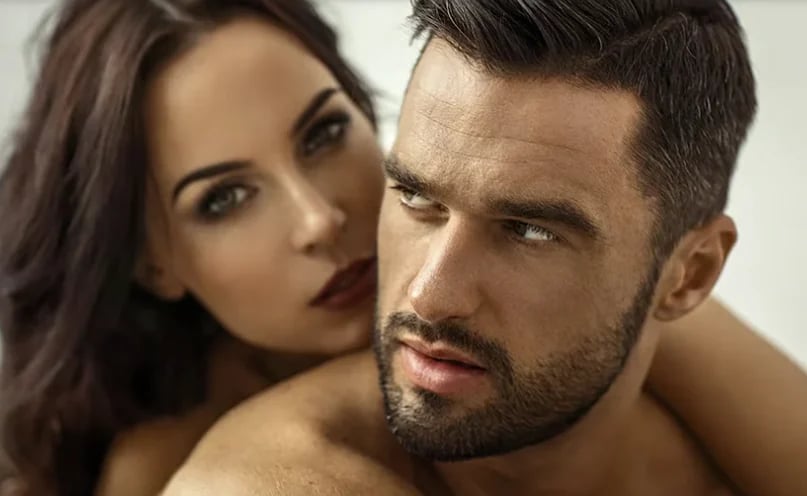 Man and woman, close-up portrait showing a full, natural hairline and beard